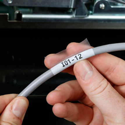 Image of a wire with the Self-Laminating Vinyl Wrap Around Labels with Ribbon for M21 Printers - 1.25"