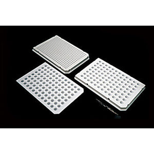 Three clear plastic 0.1 mL 96 Well PCR Plate on a black background