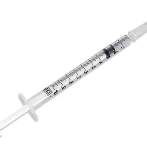 Medical syringe on a white background