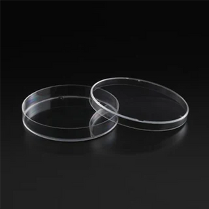 Two clear, round, Astec Bio 90mm dishes stacked on top of each other against a black background.