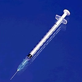 1cc tuberculin syringe stand alone with blue background